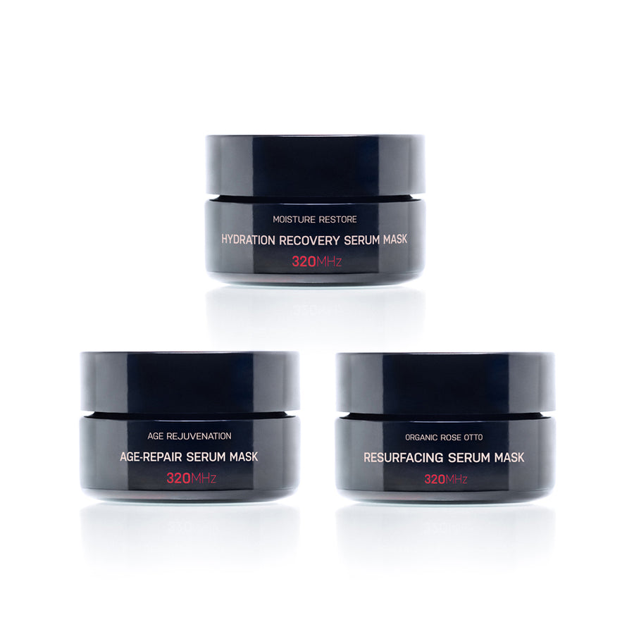Three serum mask jars with labels on a white background