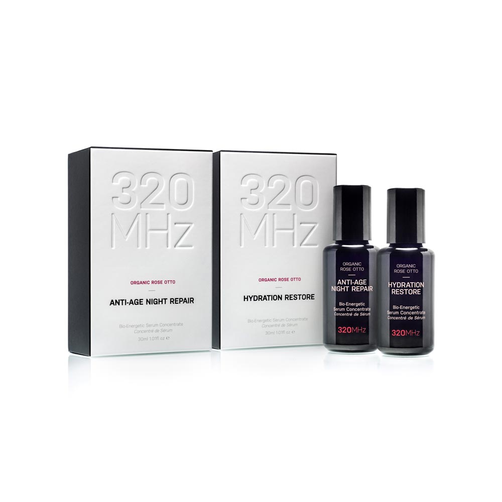 Two skincare bottles with '320 MHz' packaging on a white background